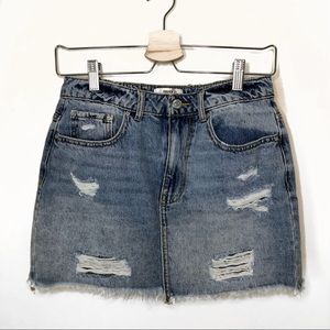 Y2K style distressed mini denim skirt